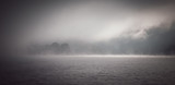 The mist in the lake in the morning. (vintage tone)