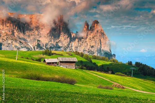 Seiser Alm resort and Mount Sciliar in background, Dolomites, Italy photo