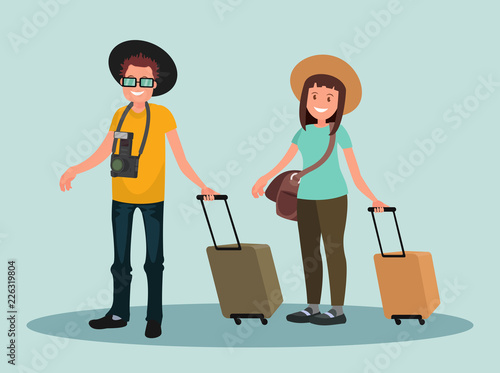 A man and a woman with suitcases. Happy couple with Luggage.