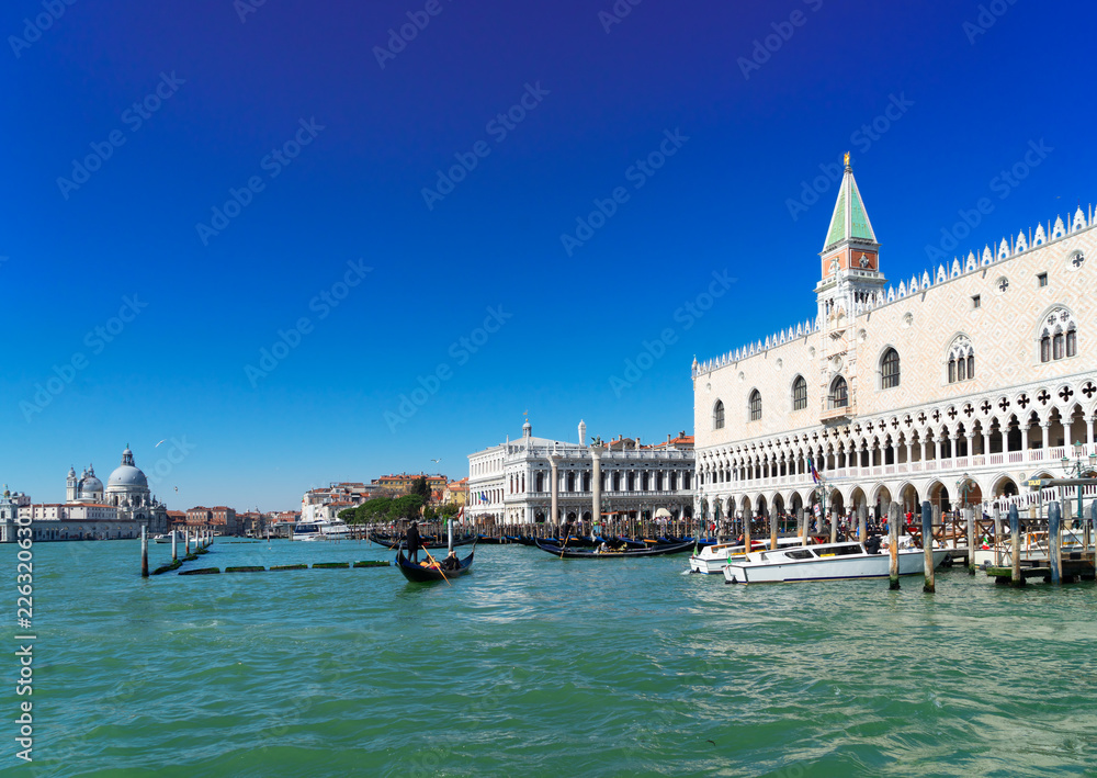 Palace of Doges at San Marco embankment and Lagoon water, Venice, Italy