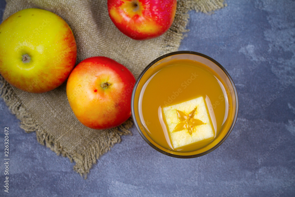 Apple cider and fruits on grey background. overhead, horizontal Apple cider and fruits on grey background. overhead, horizontal