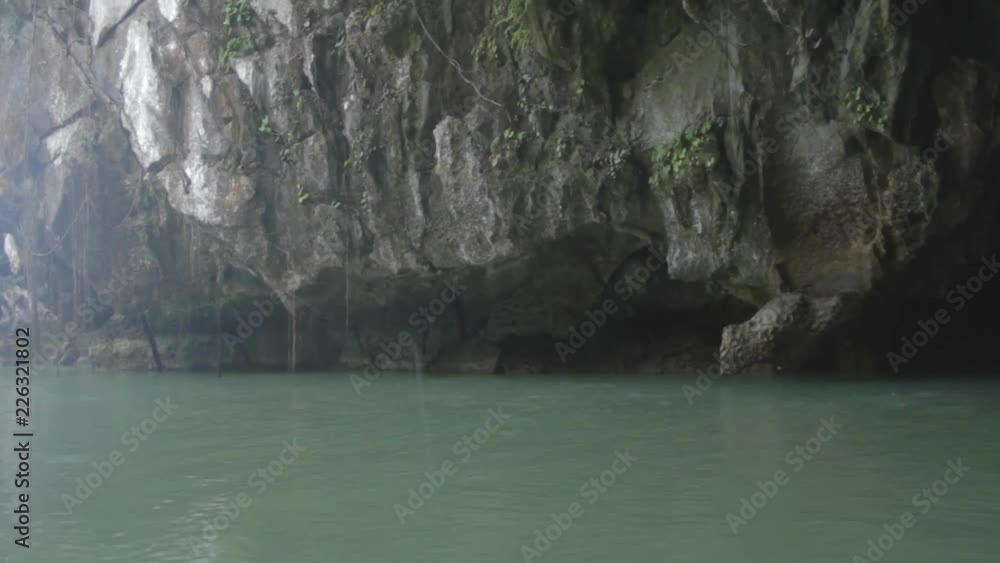 Palawan Underground Cave. Water constantly drips into the underground cave from the rocks above at the Puerto Princesa Subterranean River National Park on the Palawan Island of the Philippines. Palawan Underground Cave. Water constantly drips into the underground cave from the rocks above at the Puerto Princesa Subterranean River National Park on the Palawan Island of the Philippines.