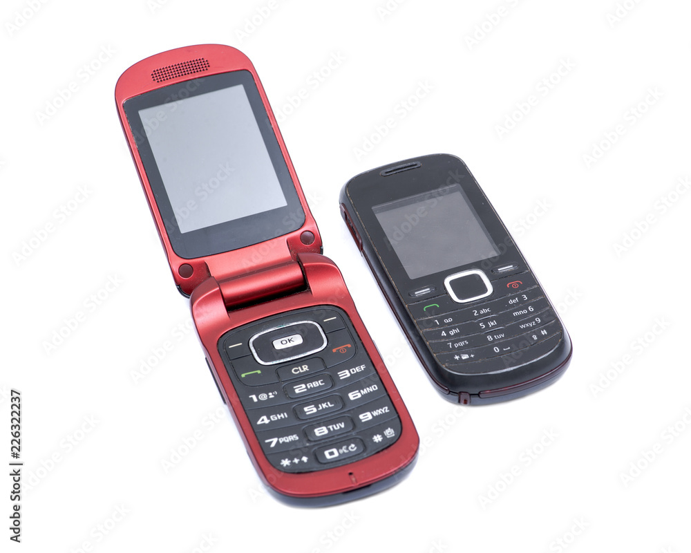 Old Used retro cell mobile phone isolated on white background Old Used retro cell mobile phone isolated on white background