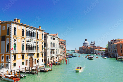 Grand canal cityscape with famous Basilica Santa Maria della Salute, Venice, Italy © neirfy