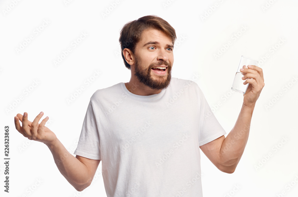 a glass of water in the hand of a man a glass of water in the hand of a man