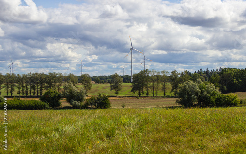 Windmills, wind farms. Renewable energy source. Landscape.