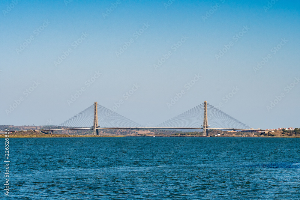 Obraz premium Guadiana International Bridge connecting Ayamonte town in Spain and Castro Marim town in Portugal