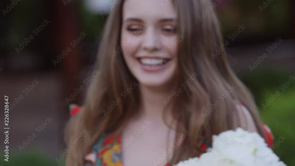 Positive wonderful girl with red hair is looking at camera 4k Close-up portrait. Positive wonderful girl with red hair is looking at camera 4k Close-up portrait.