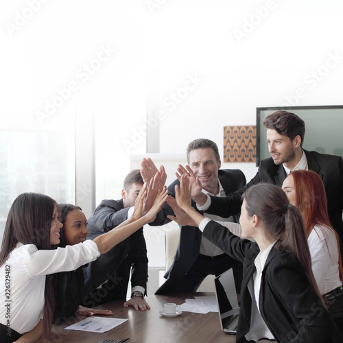 Business team making high five