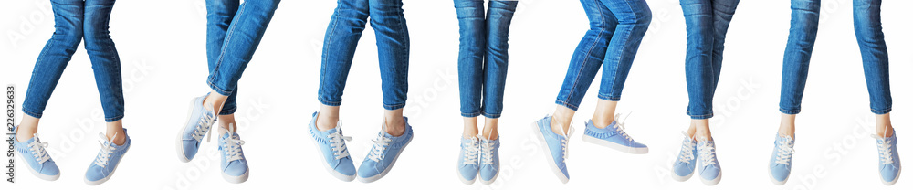 panorama set of female legs in the different poses in jeans and sneakers isolated on white background panorama set of female legs in the different poses in jeans and sneakers isolated on white background