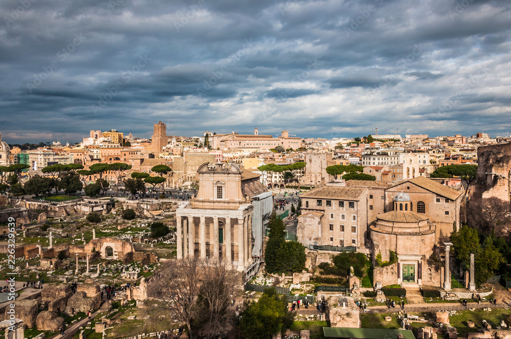 Roman forum view with cloudy sky on the background