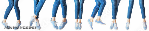 panorama set of female legs in the different poses in jeans and sneakers isolated on white background