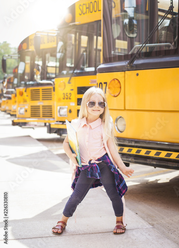 Little girl at school bus
