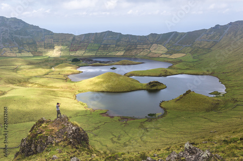 Volcano crater with a lake on the island of Corvo, Azores, Portugal photo