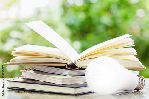 Stack of opened books with ...