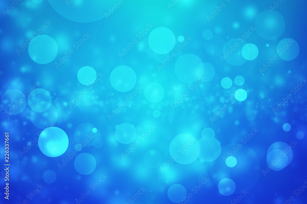 Abstract bokeh light on blue background for holidays event and celebration concept Abstract bokeh light on blue background for holidays event and celebration concept