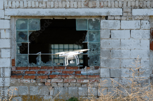 Drone quadrocopter with high resolution digital camera explores an abandoned  huge milk farm near Chernobyl area 
