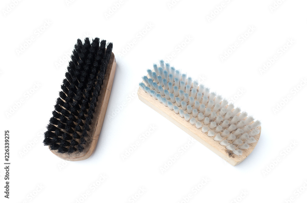 Old shoe brush isolated on white background Old shoe brush isolated on white background