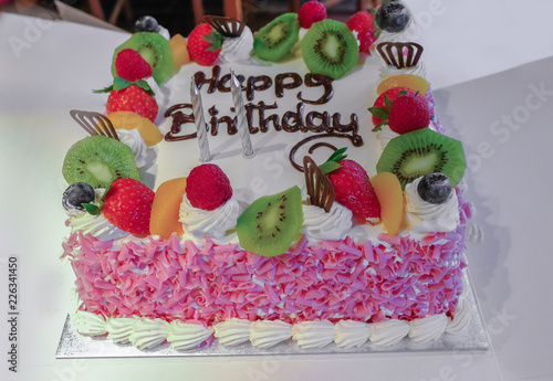 Fresh cream and fruit birthday cake. photo