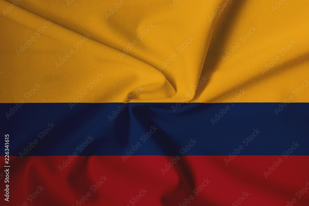 Fototapeta premium Waving Colombian flag with a fabric texture