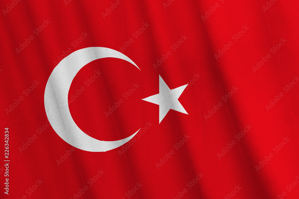 Waving Turkish flag with a fabric texture