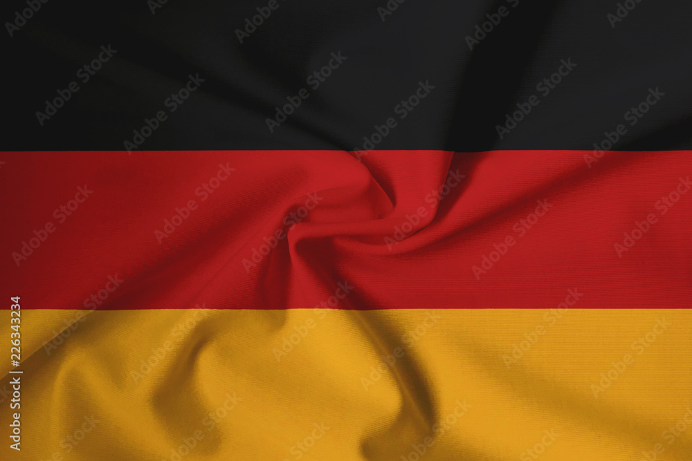 Fototapeta premium Waving German flag with a fabric texture