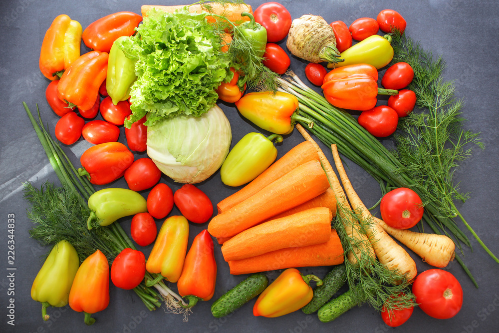 A rich variety of autumn colorful bright and fresh vegetables and roots. A rich variety of autumn colorful bright and fresh vegetables and roots.