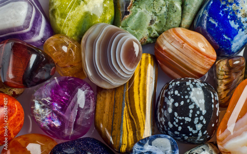 Beautiful coloured semi precious gemstones background.