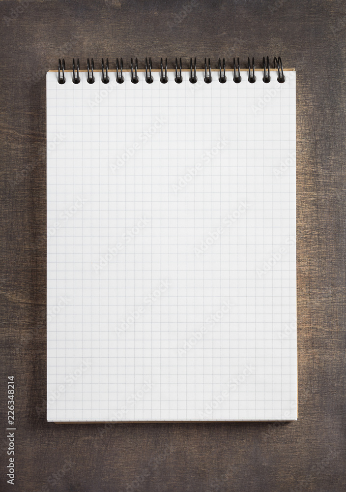 notepad at wooden background surface table notepad at wooden background surface table