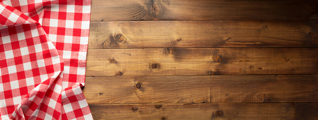 checked tablecloth at wooden  background