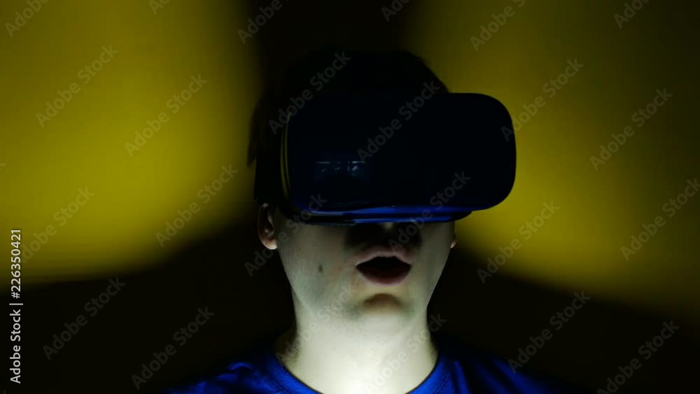 man in head-mounted display interestedly looks around, virtual reality, hmd 360 man in head-mounted display interestedly looks around, virtual reality, hmd 360