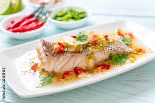 Steamed Grouper Fish Fillet with Chili Lime Sauce in lime dressing