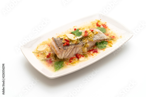 Photography Steamed Grouper Fish Fillet with Chili Lime Sauce in lime dressing