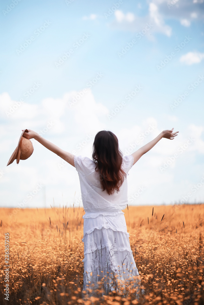 Pregnant woman in nature for a walk in the autumn Pregnant woman in nature for a walk in the autumn