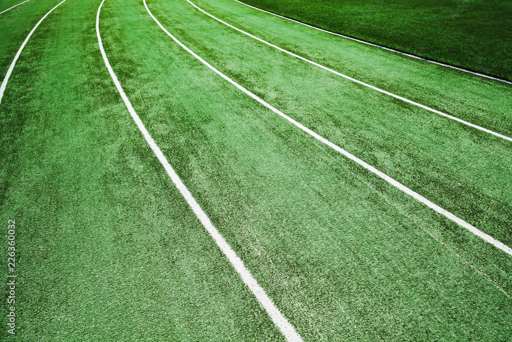 Obraz premium Empty running track with artificial turf