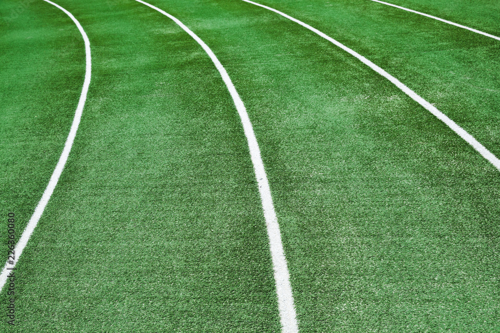 Obraz premium Empty running track with an artificial turf