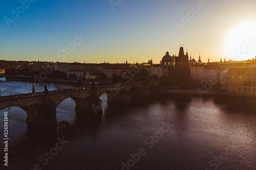 aerial view on sunrise of charles bridge in prague