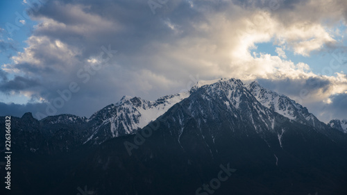 Beautiful snow alps mountains was covered by clouds at Chateau de Chillon Castle, Montreux, Switzerland