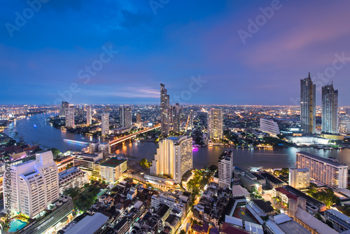Scenic view curved of the Chao Phraya River in Bangkok city downtown during twilight  capital of Thailand.
