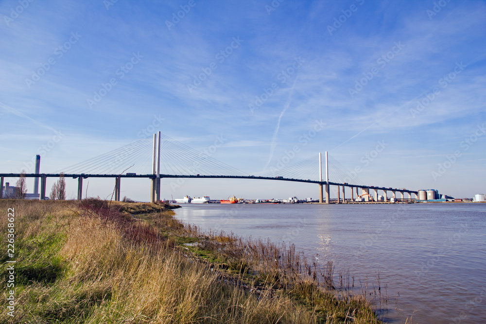 M25 motorway’s iconic Queen Elizabeth II cable-stayed Bridge or Dartford Crossing, which spans the river Thames in East London, England