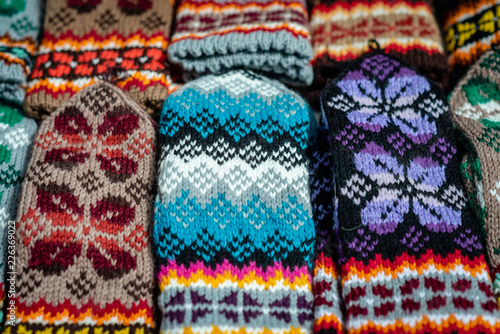 Traditional Latvian knitted woolen mittens and socks