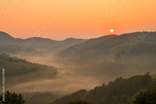 Beautiful from the nature with fog and clouds at sunrise