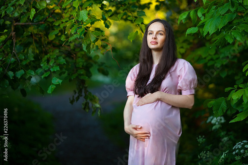 Pregnant girl on a walk in the Park. The photo was taken on a canon mark ii with the sigma 85 1.4 art. photo