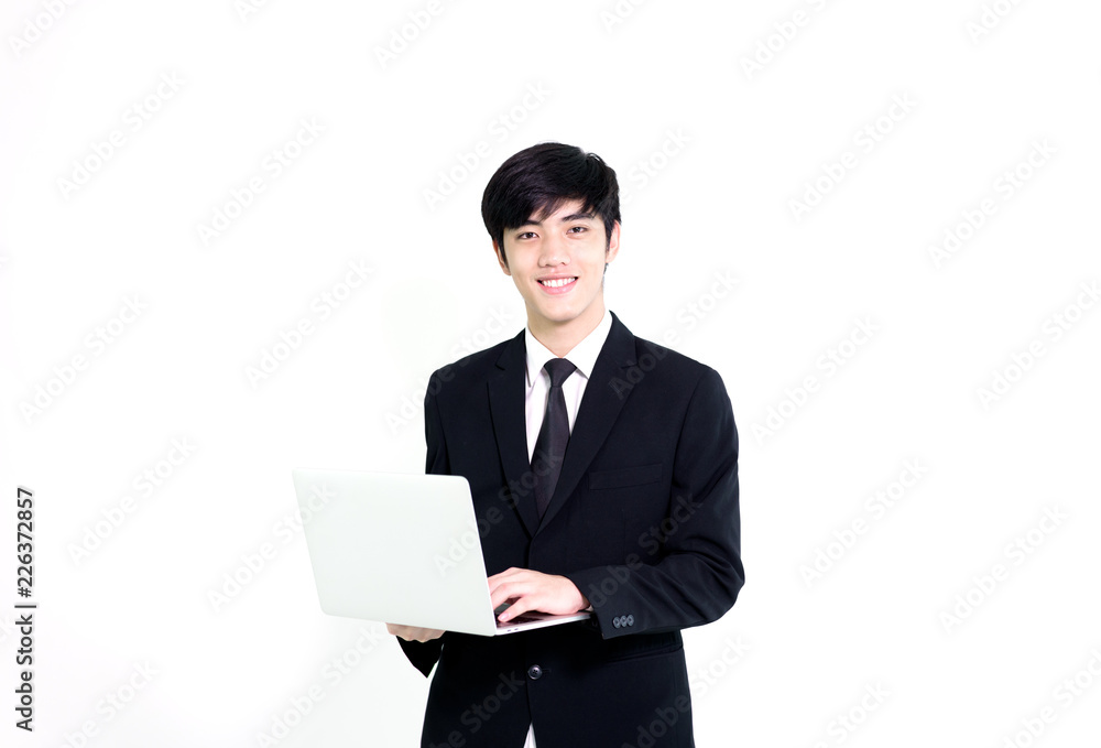 Asian business handsome man has holding laptop for woking with happy and relaxing isolated on white background. Asian business handsome man has holding laptop for woking with happy and relaxing isolated on white background.