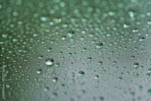 Closeup rain drops on car glass with hydrophobic coating
