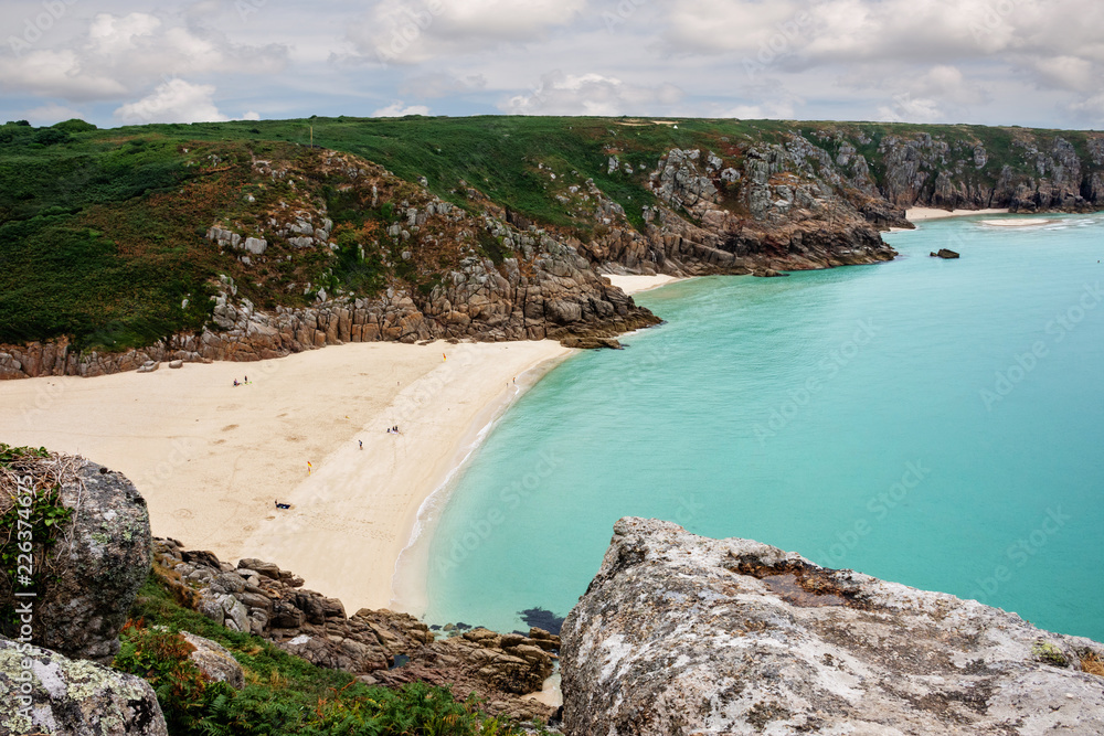 Obraz premium View over Porthcurno Beach seen from Minack Open Air Theatre, Cornwall, England, UK