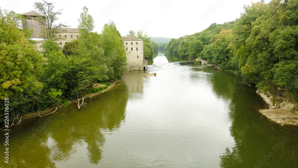 The River Aveyron and the surrounding gorges at St Antonin Noble Val in France The River Aveyron and the surrounding gorges at St Antonin Noble Val in France