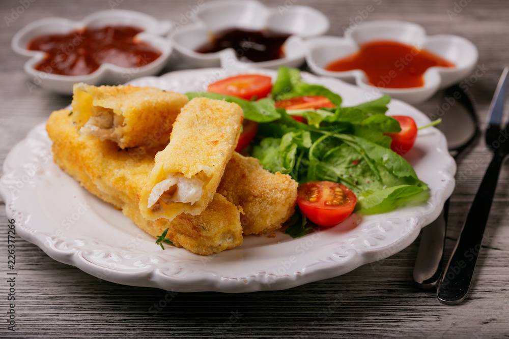 Fish sticks and sauces Fish sticks and sauces