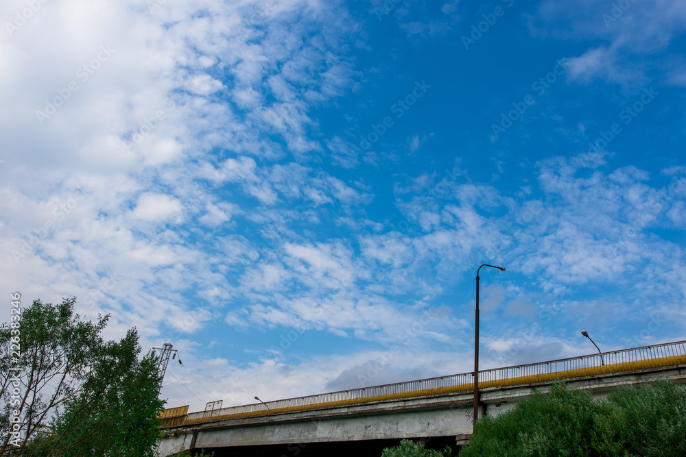 car bridge against the blue sky with clouds car bridge against the blue sky with clouds