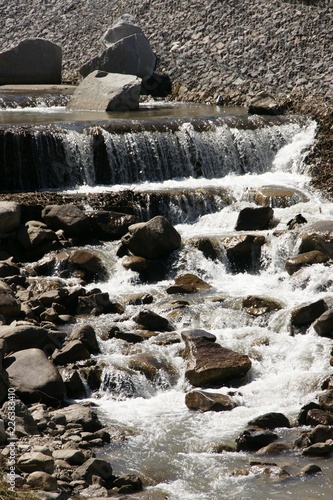 small spring waterfall in Kazahkstan in Almaty in the Medeo Mountains